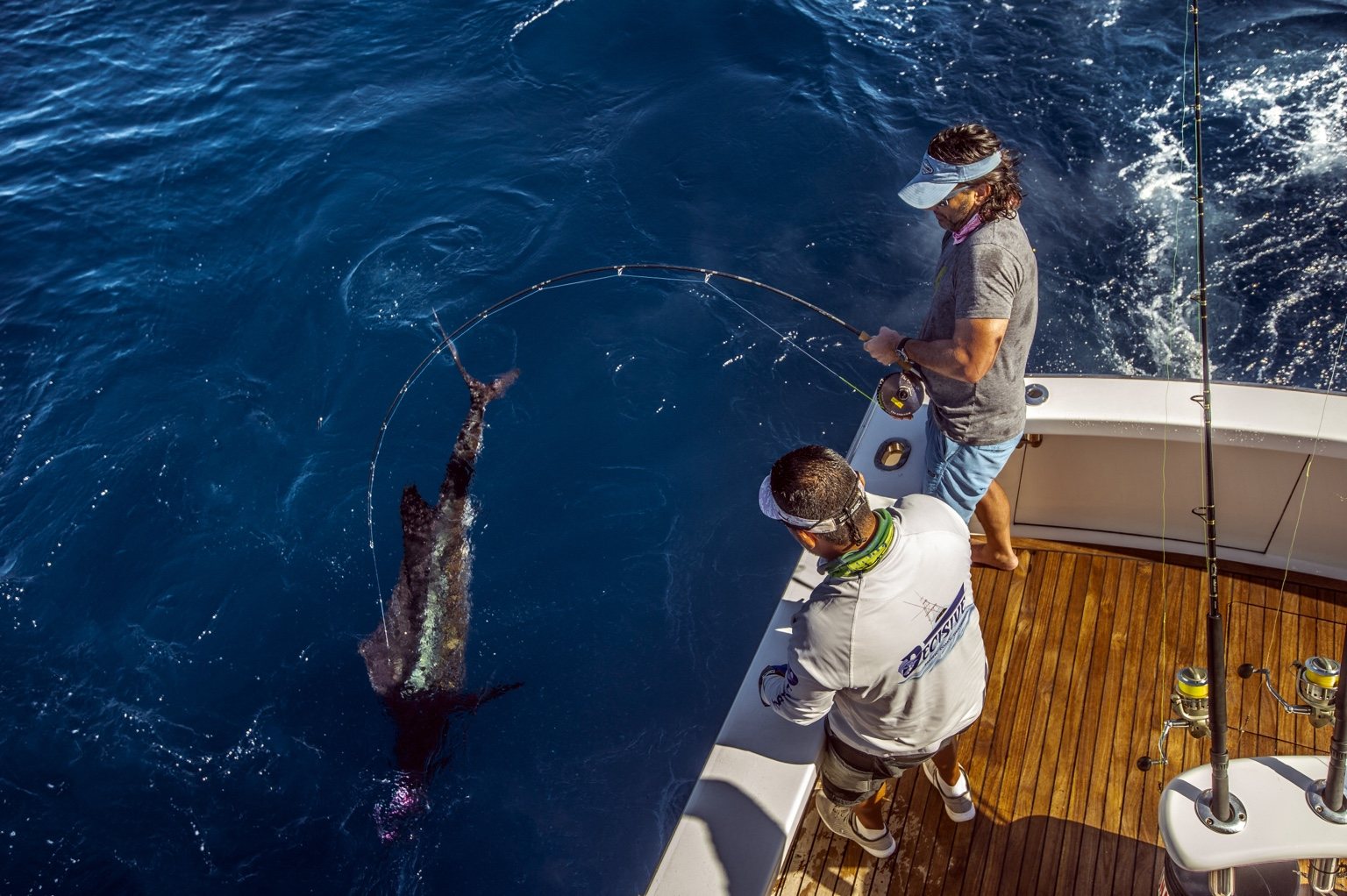 GBA crew and angler working together during a billfish release in Guatemala