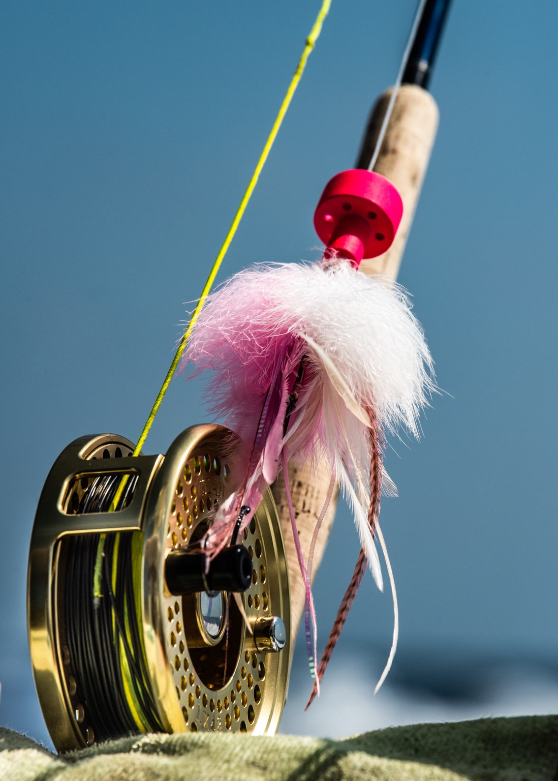 Offshore fly-fishing reel and fly detail photographed by Mark Hatter